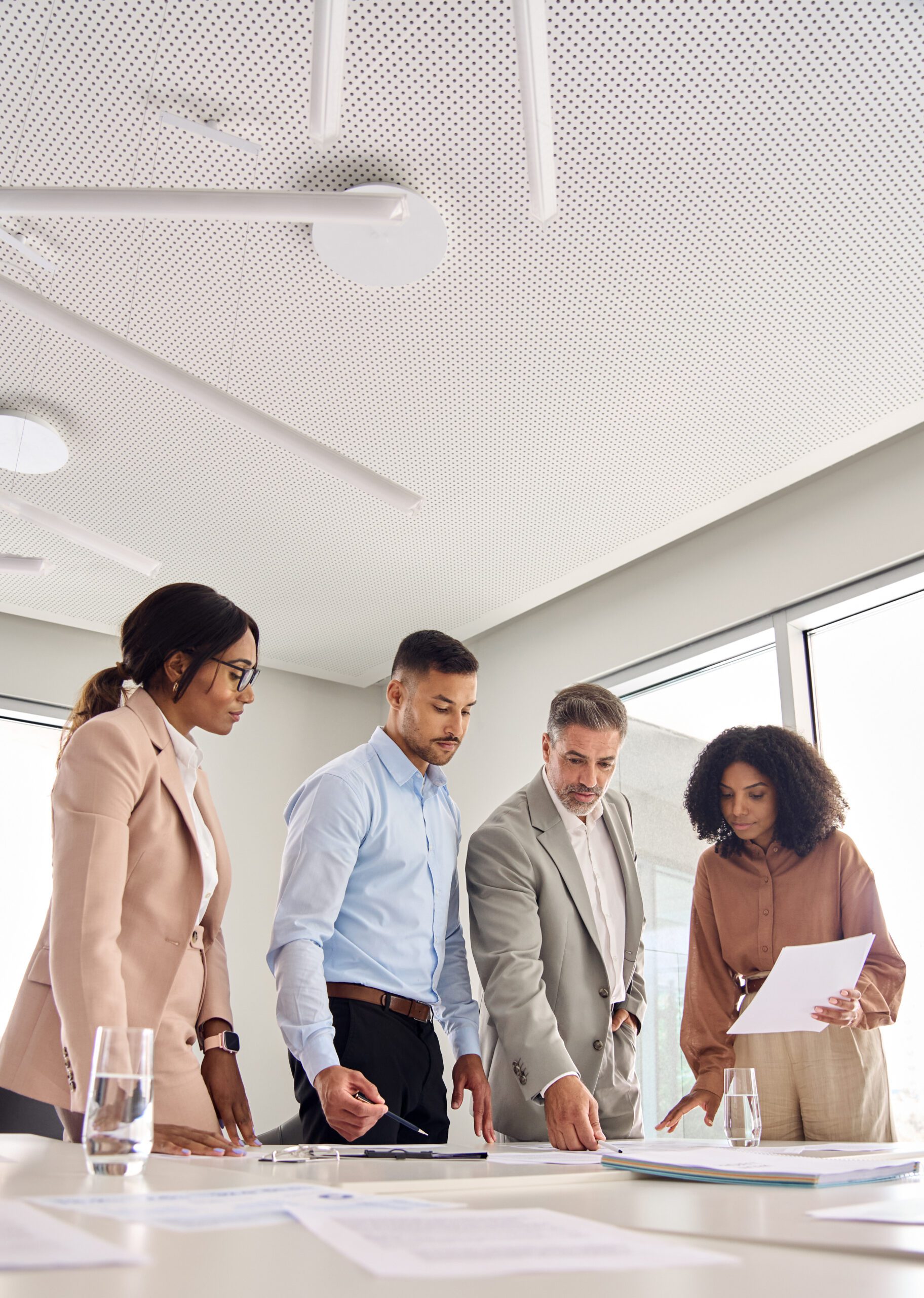 Business team people working standing at table office meeting, vertical.